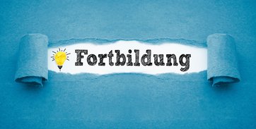 Eine Glühlampe mit dem Wort Fortbildung